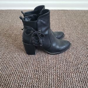 Black boots. Oliva Miller Brand.